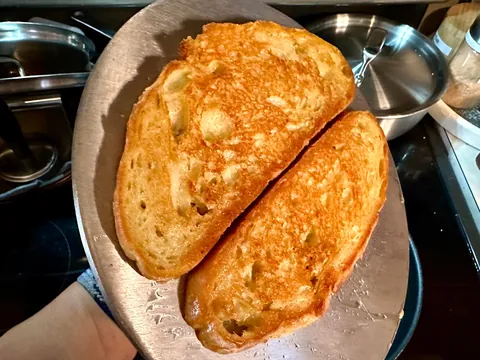 Mozzarella, tomato, and pesto melt on [homemade] bread