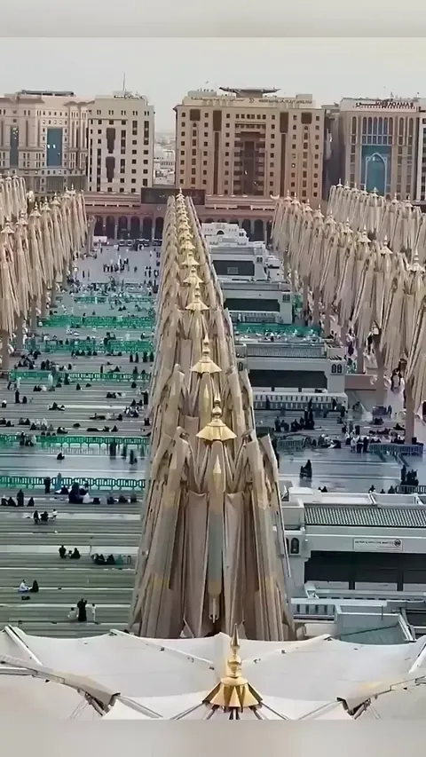 Massive umbrellas in Saudi Arabia that bloom open to shield crowds from the desert heat