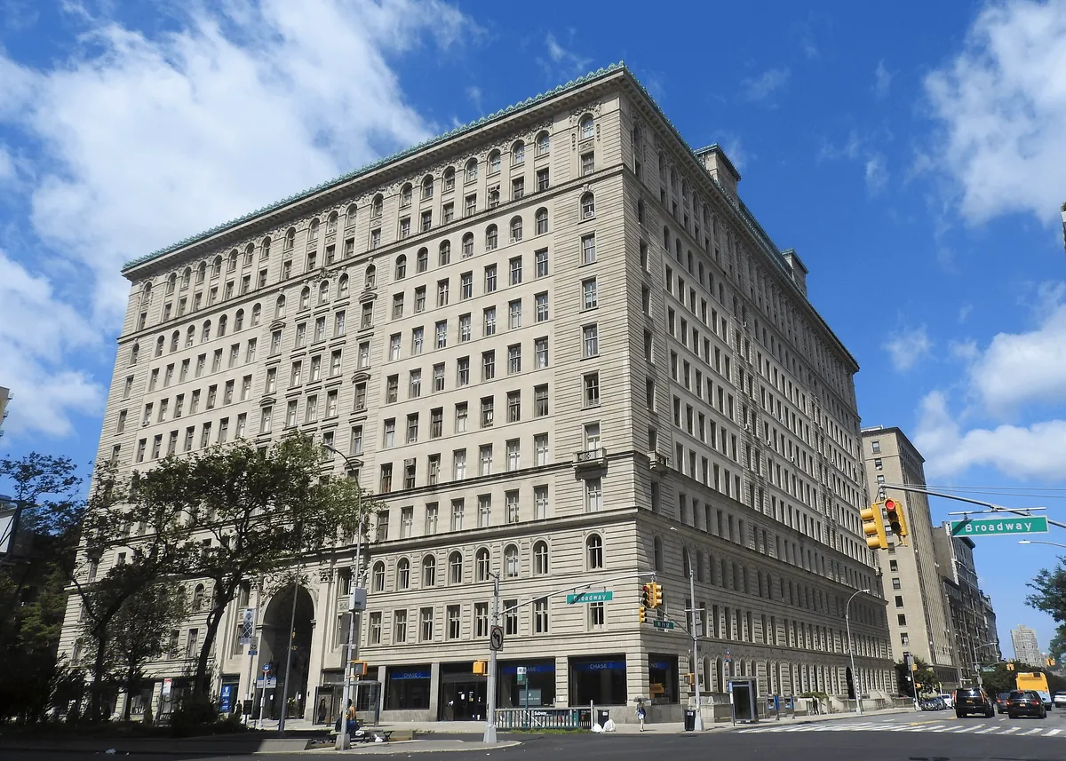 Why don't a lot of New York residential apartments have balconies while most Parisian buildings do?