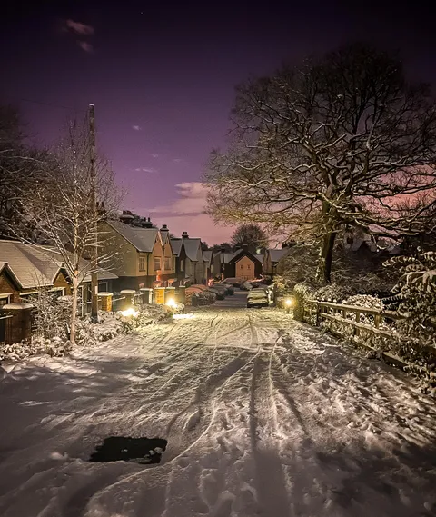 ITAP of a snowy British cul-de-sac at night