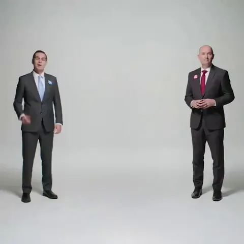 Two politicians make an ad getting along instead of fighting each other