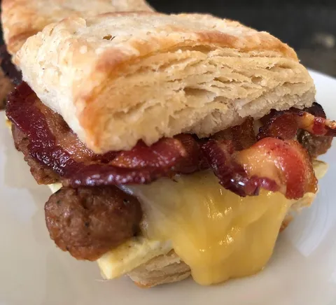 Homemade Super flaky biscuit bacon sausage egg and gouda [oc] [1024x930]