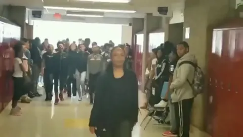 Teacher teaches students to dance '' Thriller ''