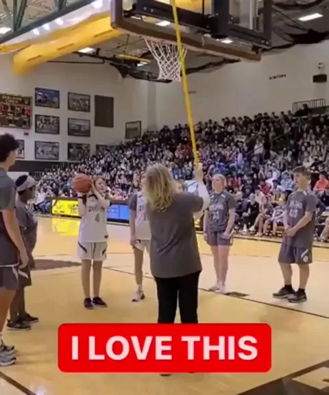 Crowd stays silent so Jules Hoogland, who is blind, can hear where to throw. She definitely heard the cheers.