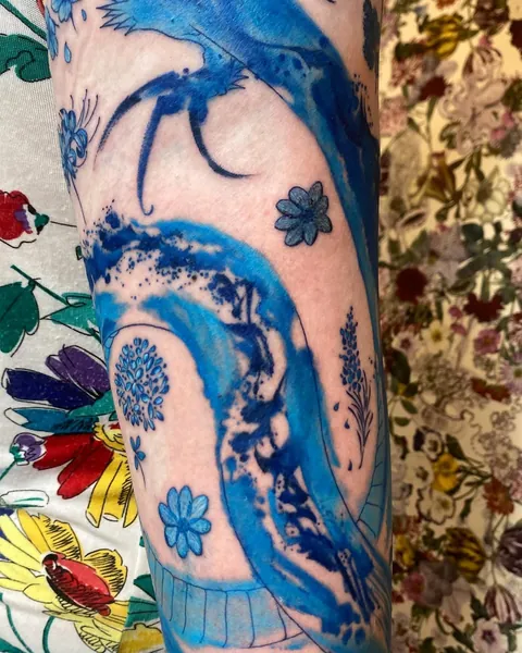 Blue abstract dragon &amp; flowers- my first tattoo by Haruka (Tokyo)
