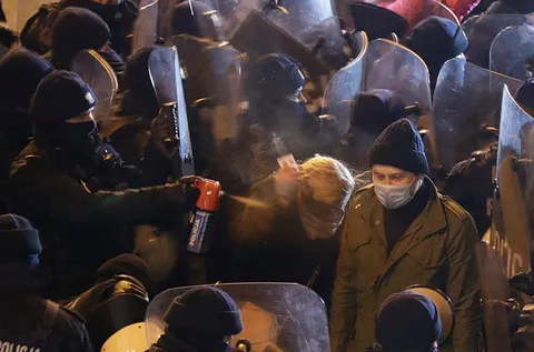 MP Barbara Nowacka getting sprayed in the face by the police during Women's protests in Warsaw yesterday. She's holding her MP ID card in her hand.