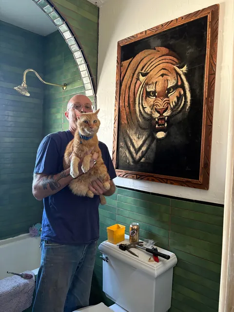 My husband and his cat remodeled our bathroom. He’s a tough foreman (the cat)
