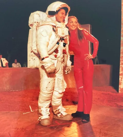 Britney Spears being the Princess of Pop on the set of "Oops!... I Did It Again" in November 1999