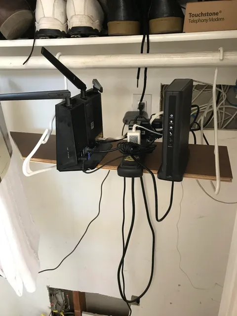 My parents used two coat hangers and scrap wood for a temporary shelf.