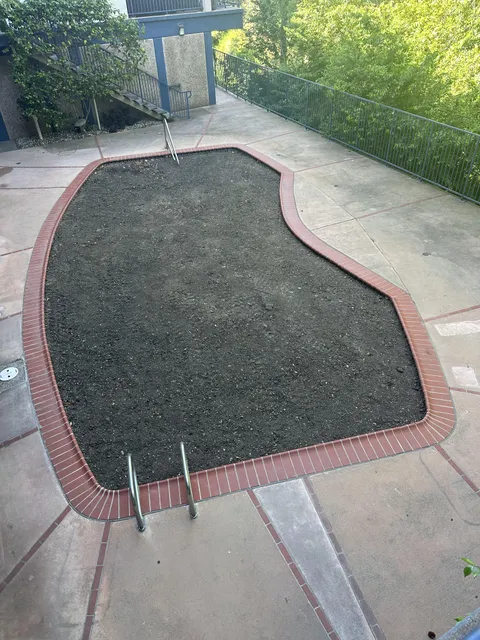 Apartment complex filled our pool with dirt… then raised the rent