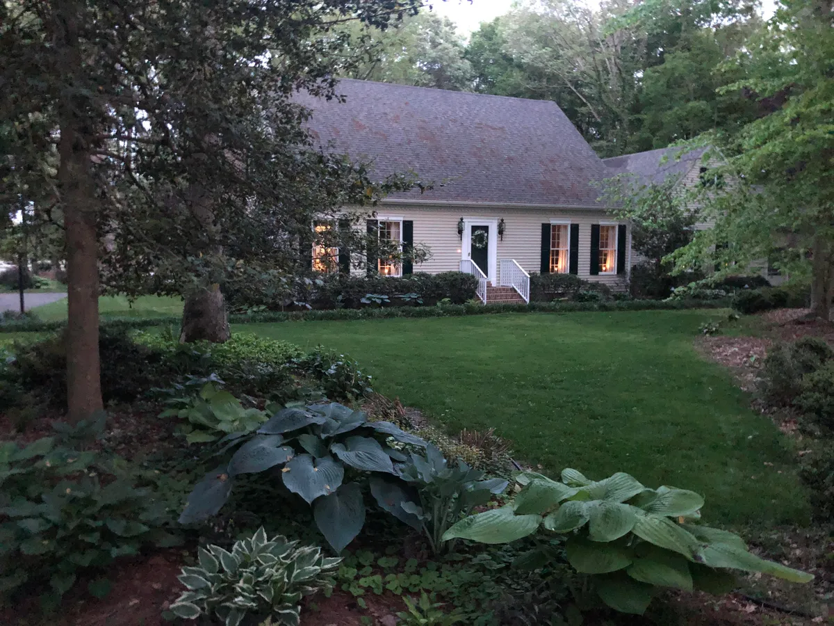 My grandparents' house at dusk. It looks like something out of a fairytale.