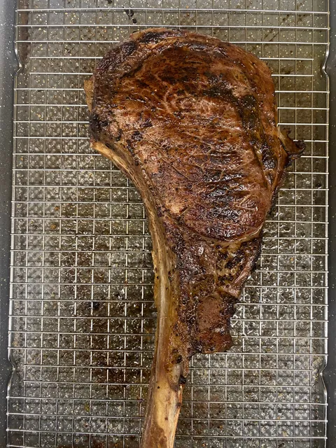 [Homemade] Tomahawk steak with mac &amp; cheese and chimichurri sauce for my girlfriend's birthday dinner.