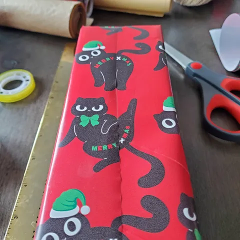 The way the wrapping paper design lined up on the gift. (OC)