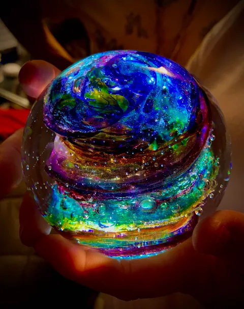 My dog Diesel passed away last month. I had him cremated and his ashes spun in this orb.