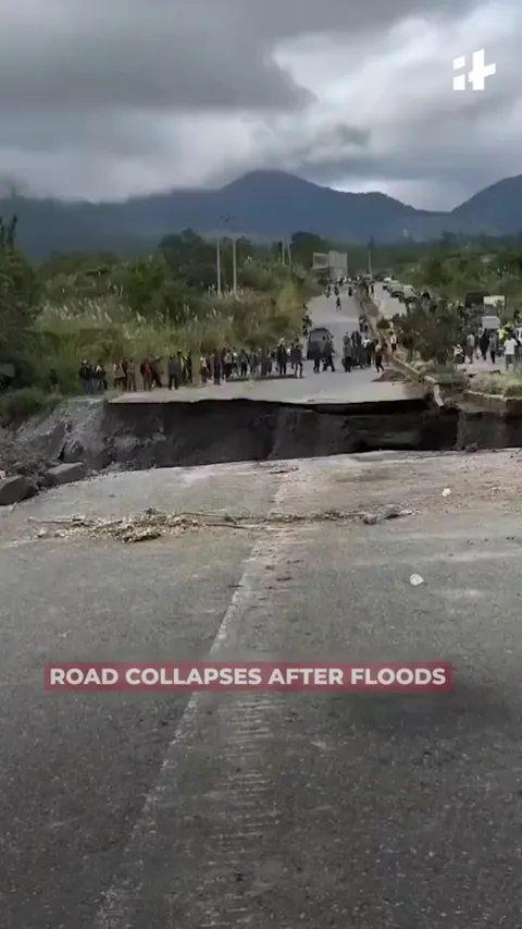 The moment a roadway in Indonesia suddenly collapses after days of heavy rain