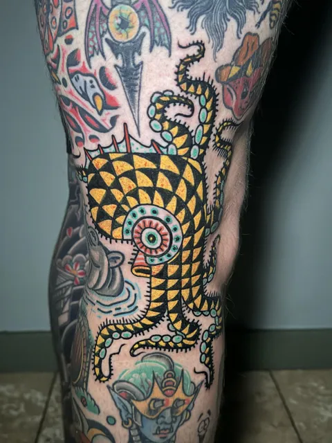 Squid on the side of my knee by Deno at Great Lakes Tattoo (Chicago, IL) 