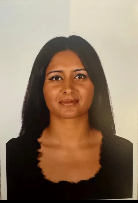 My mum doing a photoshoot (1999)