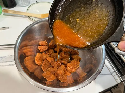 [homemade] boneless wings or saucy nugs or popcorn chicken or something.