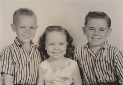 My mom's annual Christmas cards included a portrait of my big brothers and me. 1953-1959