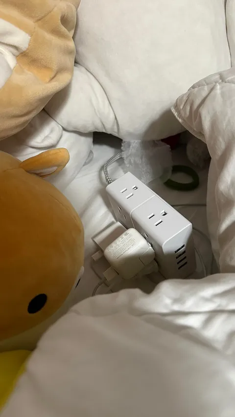 my sister doesn’t listen to me of the danger of half-plugged chargers in an extension outlet ON her bed