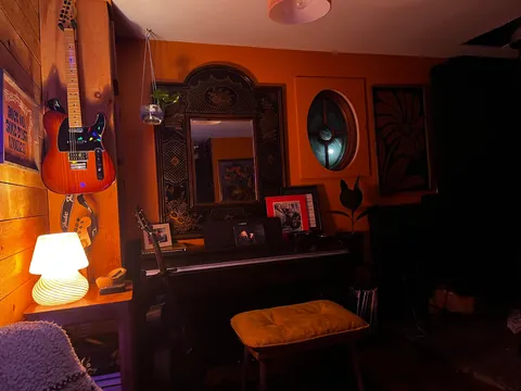 Cozy vibes in my music room with the moon in view out the window