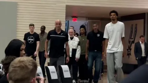 The entire San Antonio Spurs team escorted Gregg Popovich to his first press conference since suffering a Stroke