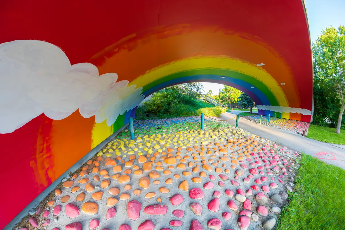 the underside of this bridge is painted like a rainbow
