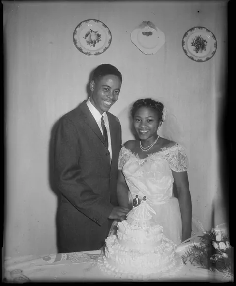 Young couple pose for their wedding photos, Pittsburgh, Pennsylvania, 1959.