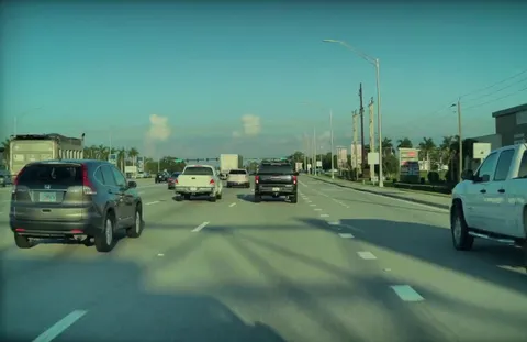 Dump truck driver endangers everyone to save time... ends up waiting anyway