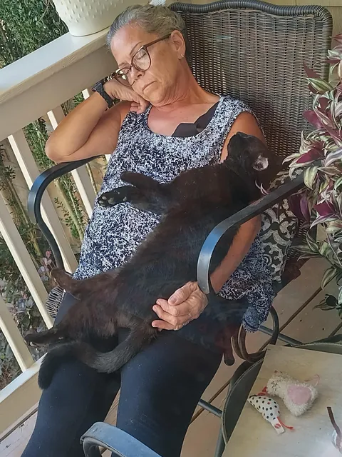 Mom with the cat she didn’t want