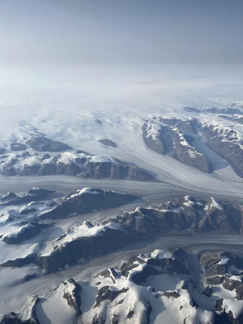 Greenland from an airplane [OC] [3024 × 4032]