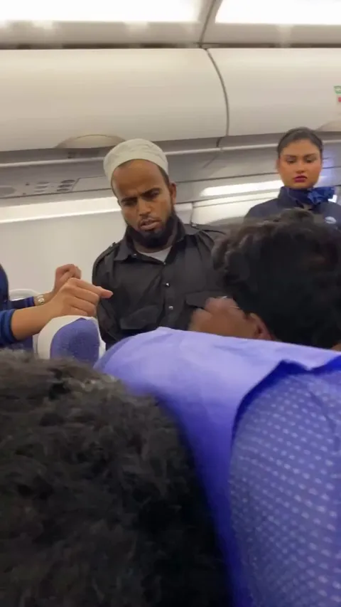 A man who had never flown before suffered a panic attack, forcing the plane to land. An angry passenger slapped him which got another passenger angry at the man that slapped the poor soul