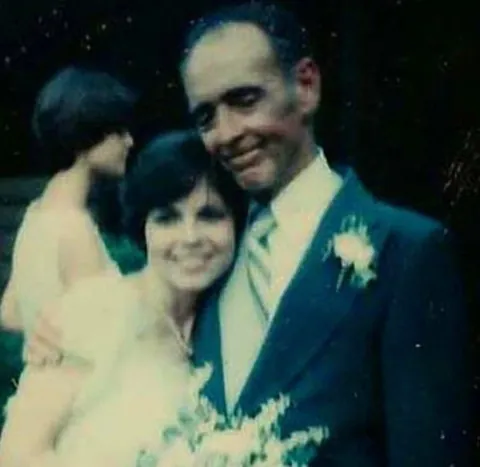 My dad helping to calm my nerves before walking down the aisle, and the after. 1979