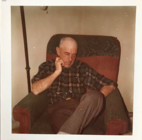 My dad ran a small farm that kept us fed, and ran lines for a power company. I remember that he could fall asleep almost anywhere - but this chair was a favourite spot. 1967