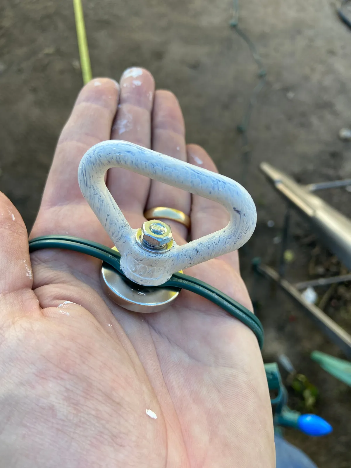 How I hang my Christmas lights with magnets and a long pole