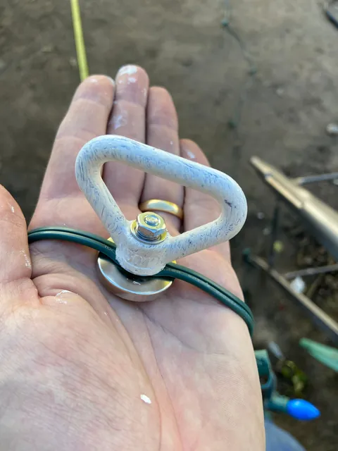 How I hang my Christmas lights with magnets and a long pole