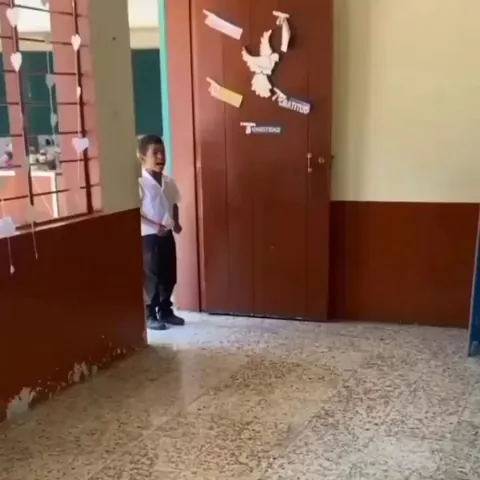 A teacher and classmates surprised a boy who had never celebrated his birthday before