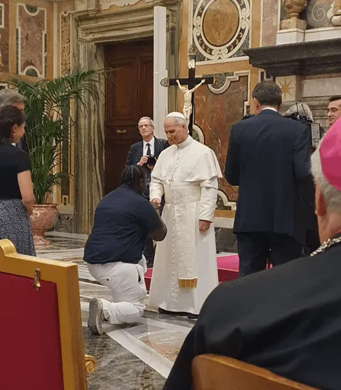 A man got his “Popplio” pokémon card autographed by Pope Leo