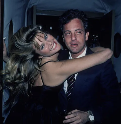 Billy Joel with his "Uptown Girl" Christie Brinkley in 1983