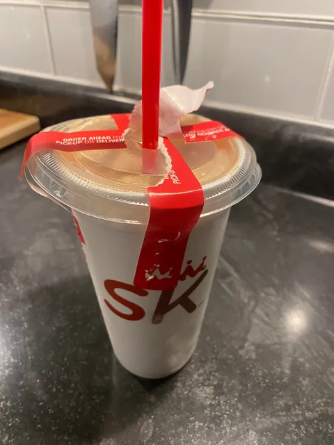 Ran out of small lids, so they used a large one and taped it down, instead of using a large cup and explaining the shortage. It made a mess in my car.