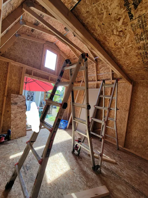 How to safely attach a swing in my new shed? Needs to be able to hold up to 450-600 lb weight.