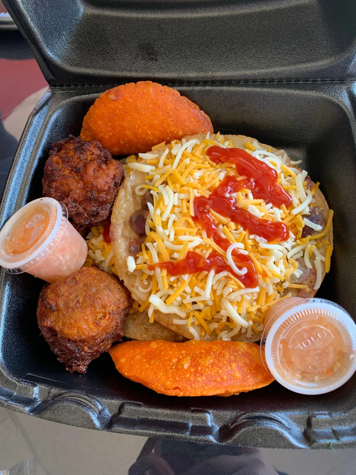 [i ate] Guyanese food! (Jerk chicken, rice and peas,stewed cabbage, conch fritters)