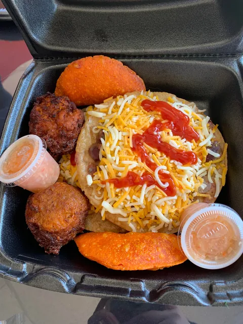[i ate] Guyanese food! (Jerk chicken, rice and peas,stewed cabbage, conch fritters)