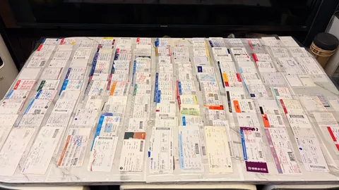 My Boarding pass , room key, and attraction map