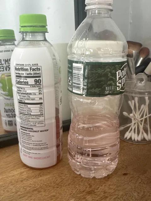 Why did the water in my water bottle turn pink?