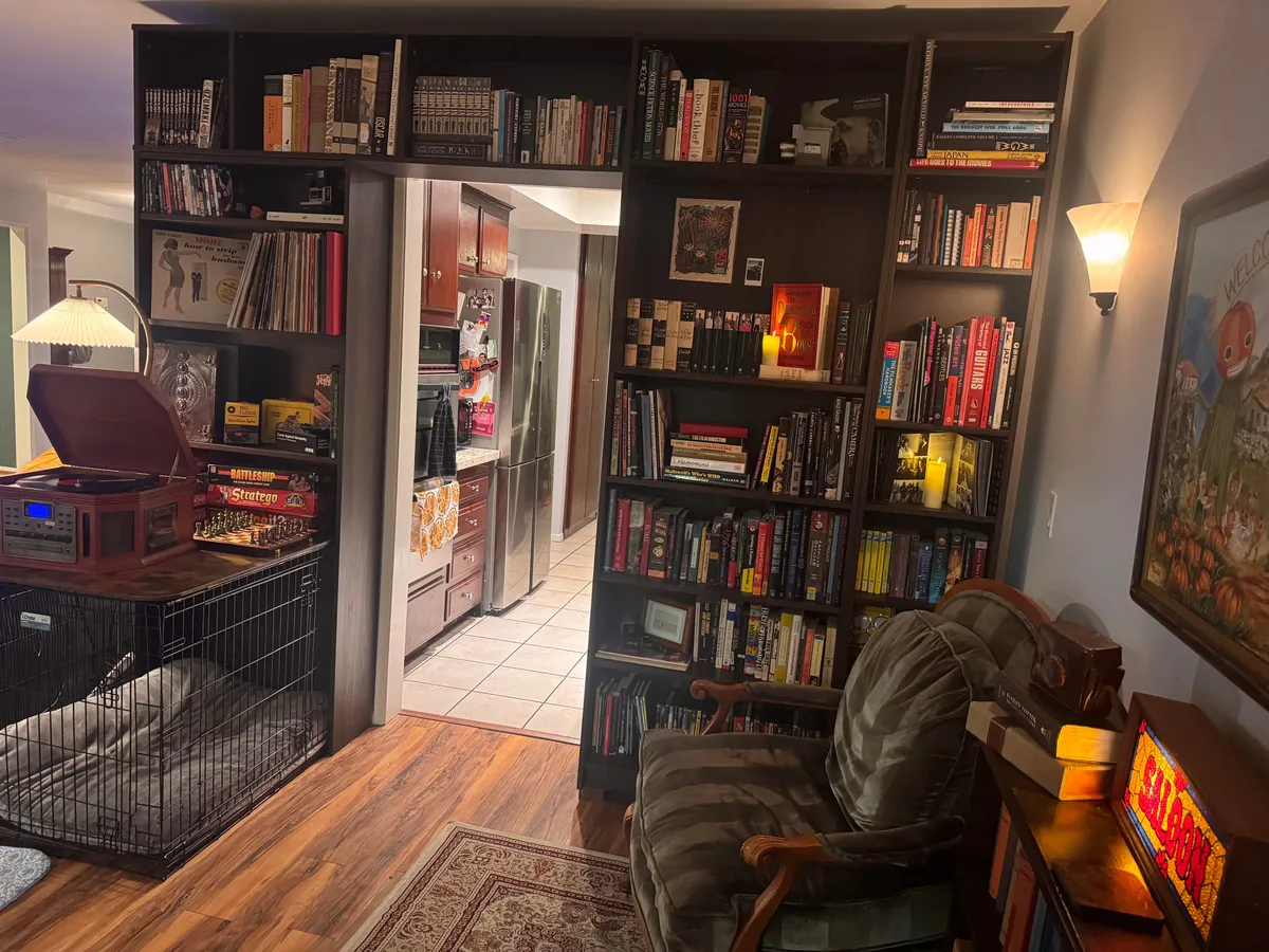 Built custom bookshelves by cutting and faceting ikea shelves together (before and after)