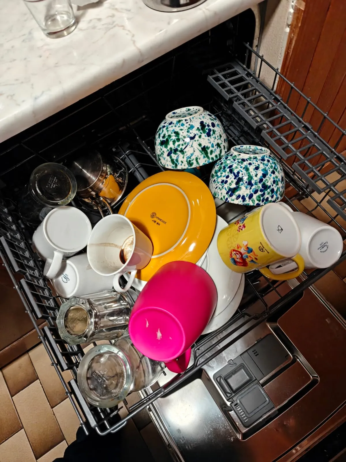 New cleaning lady came yesterday and this is how she loaded the dishwasher