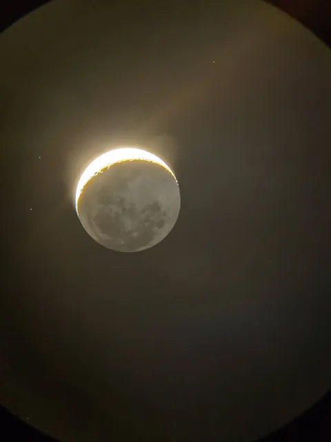 I took this photo last night from my telescope eyepiece