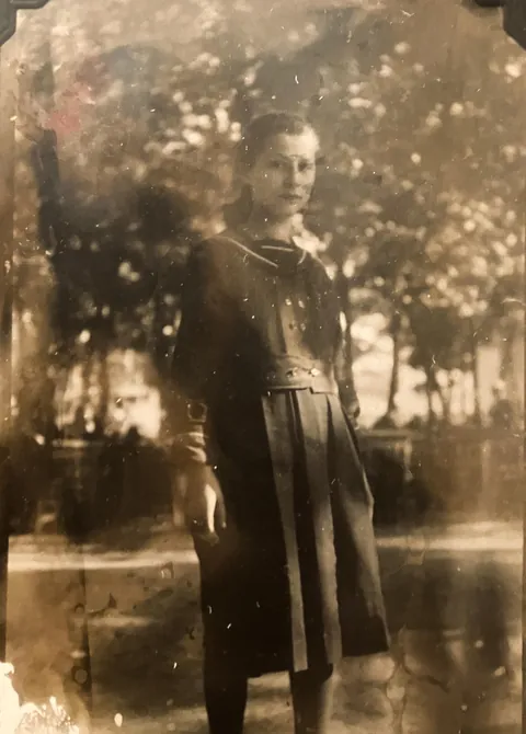my great grandma as a teenager posing at the park / chicago c 1920