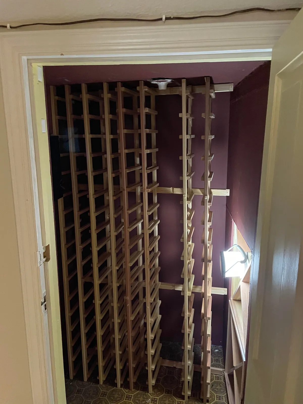 Built a wine closet under some stairs